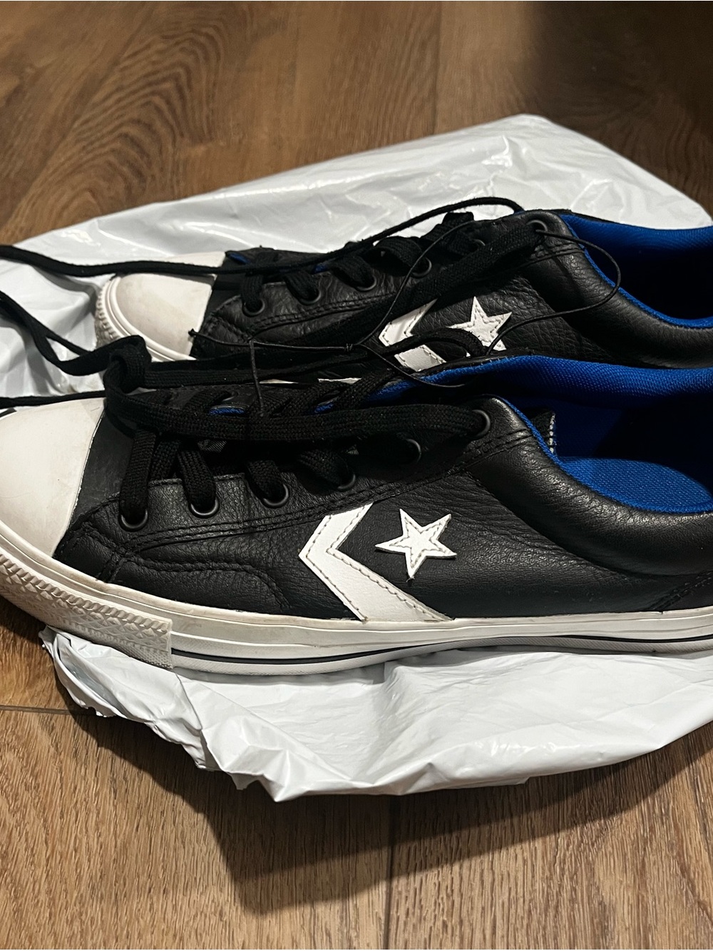 Converse Black Low-Top Cons Sneakers with White Star Chevron and Blue Interior